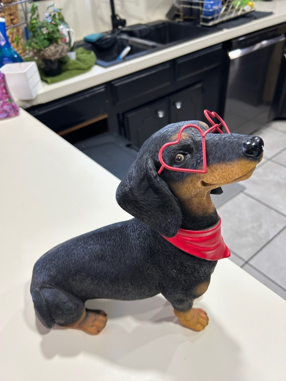 Black and Tan Dachshund Dog Figurine with Red Bandana and Heart Glasses